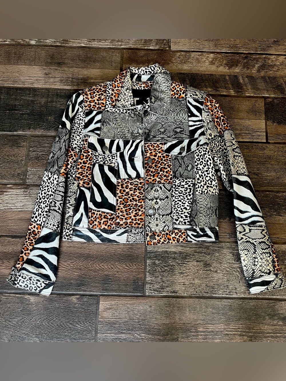 Wilson’s Leather Maxima Leather jacket with different animal prints S Vtg?